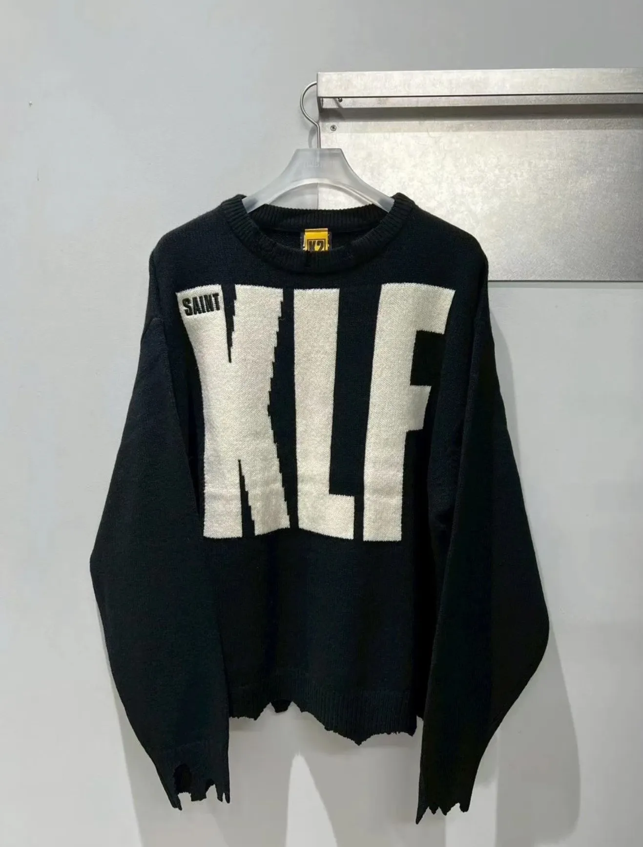❥4040#P240 New Saint Michael ✖️ KLF destroyed sweater made of black sheepskin material, KLF saint embroidery on the front, super visual impact! Distressed design, full of street feel, same style for men and women, a must-have for autumn and winter wear. Dark style + unique artistic sense, fashionable people and celebrities are picking it up, it looks cool if you wear it casually! Craftsmanship: The whole piece is cut and aged by hand, very slow! Weight: 900g Color: Black Size: S M L XL